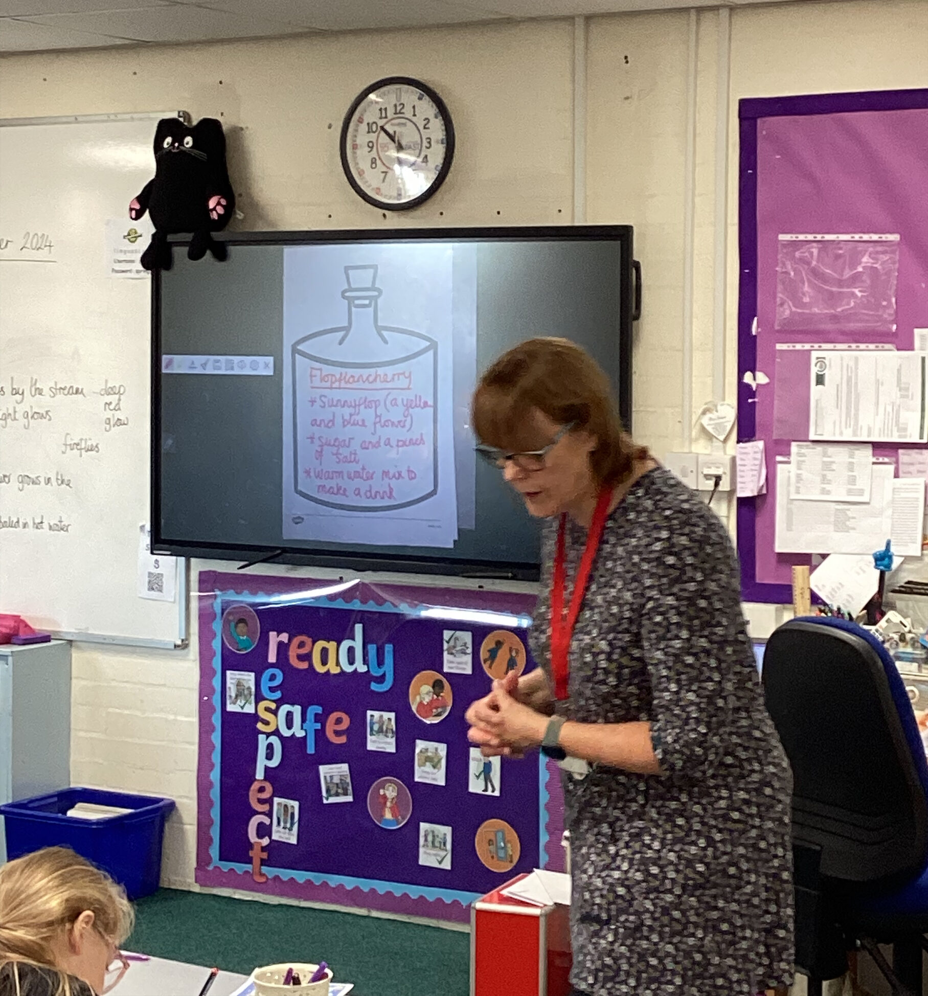 Debby going through the class exercises from her books